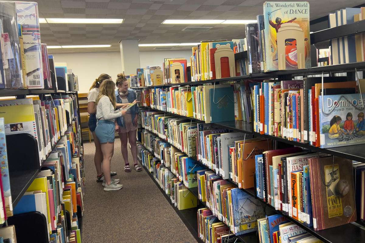 Students browsing the children's collection. 